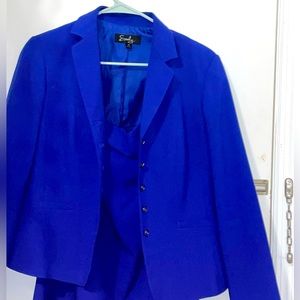 Skirt suit, sold as a set. Lightly worn, machine washable